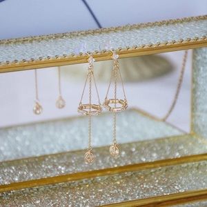 Abbott Atelier gold sparkly dangle earrings